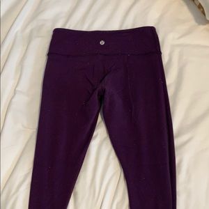 Black/Purple Wunderunder Lululemon leggings.